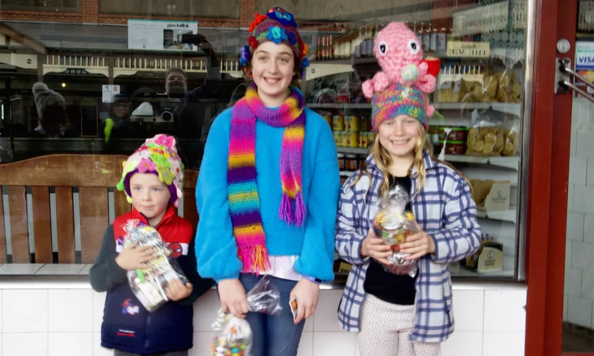 Patrick with petals, Enchanted Rose and Weird, Wonderful Maddie in their brilliant beanies.