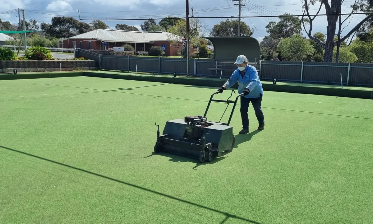 Bowling green surface being groomed in readiness for the new Pennant season.