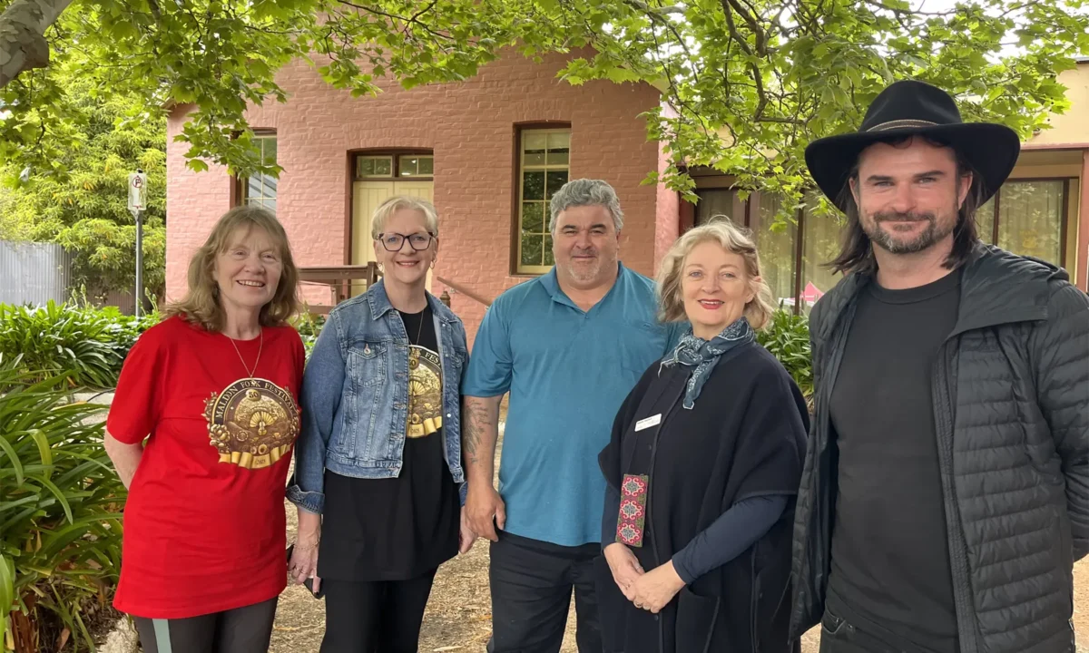 From Left: Festival Director Pam Lyons; Member for Bendigo West Maree Edwards MP; Dja Dja Wurrung Traditional Owner Jason Kerr; Councillor Rosalie Hastwell; Chair of Community Bank Maldon & District Matthew Gordon at the opening of the 50th Maldon Folk Festival.